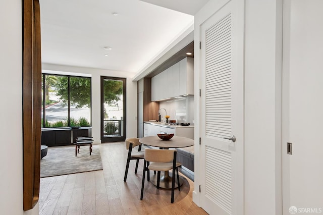 1 Bristol Ct Unit 202, San Francisco, CA 94130 - dining space featuring light wood-style flooring