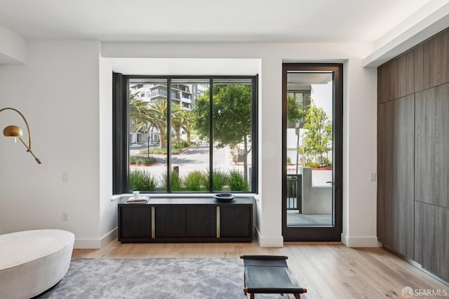 1 Bristol Ct Unit 202, San Francisco, CA 94130 - sitting room with light wood finished floors and baseboards