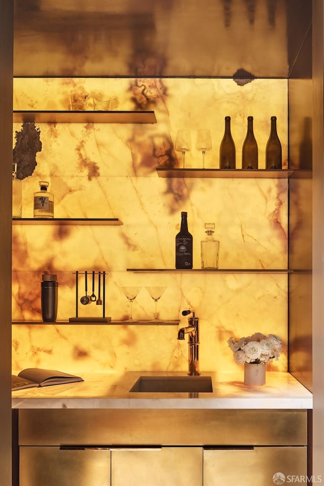 interior details featuring a sink and light countertops