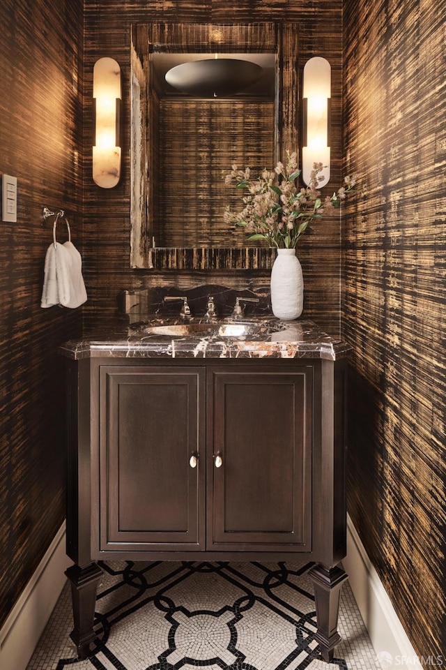 bathroom with vanity and tile patterned flooring