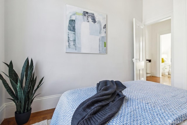 bedroom featuring hardwood / wood-style flooring