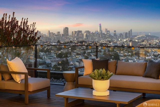 balcony at dusk with outdoor lounge area