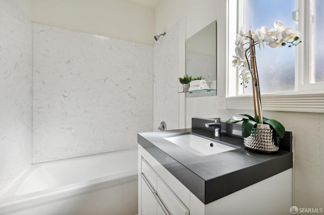 full bathroom featuring bathtub / shower combination and vanity