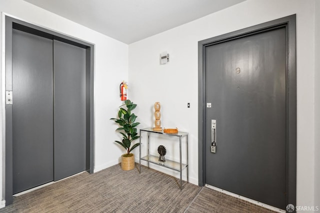 view of exterior entry featuring elevator
