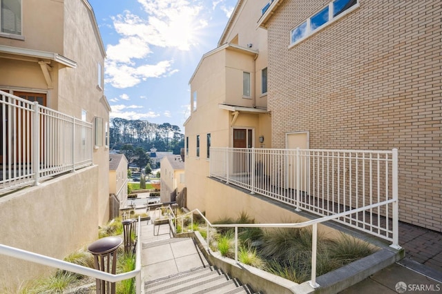 view of side of home with a mountain view