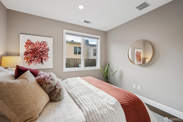 bedroom featuring wood-type flooring