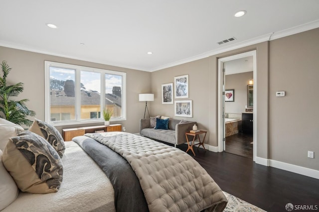 bedroom with ensuite bathroom, dark hardwood / wood-style floors, and crown molding