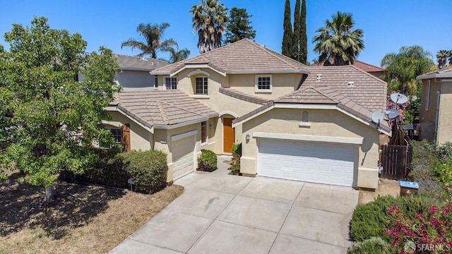 1845 Kern Mountain Way, Antioch, CA 94531 - traditional home with stucco siding, an attached garage, driveway, and a tile roof