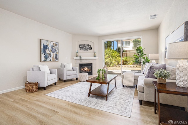 1845 Kern Mountain Way, Antioch, CA 94531 - living room featuring wood finished floors, a fireplace, and baseboards