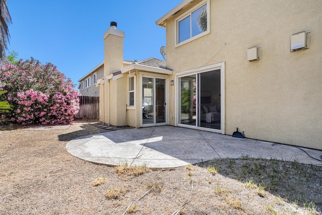 1845 Kern Mountain Way, Antioch, CA 94531 - rear view of property with stucco siding, a patio, and a chimney