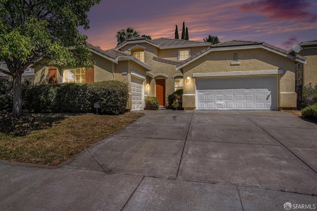 1845 Kern Mountain Way, Antioch, CA 94531 - traditional home featuring concrete driveway, a garage, stucco siding, and a tiled roof