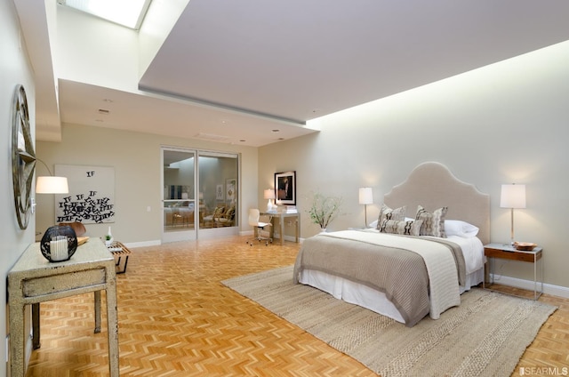 bedroom featuring parquet flooring