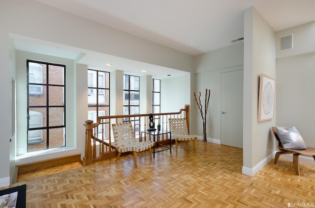 interior space with light parquet floors