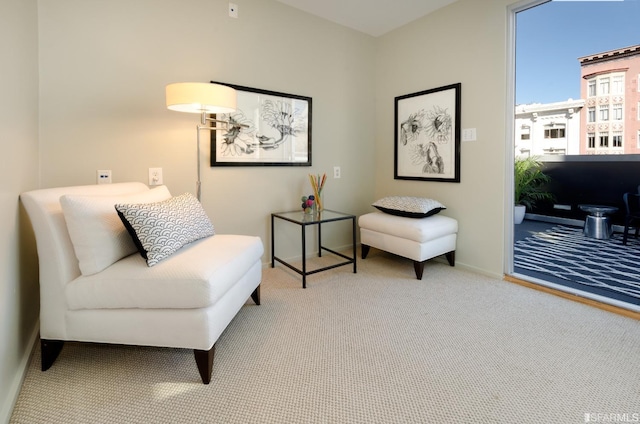 living area with carpet flooring