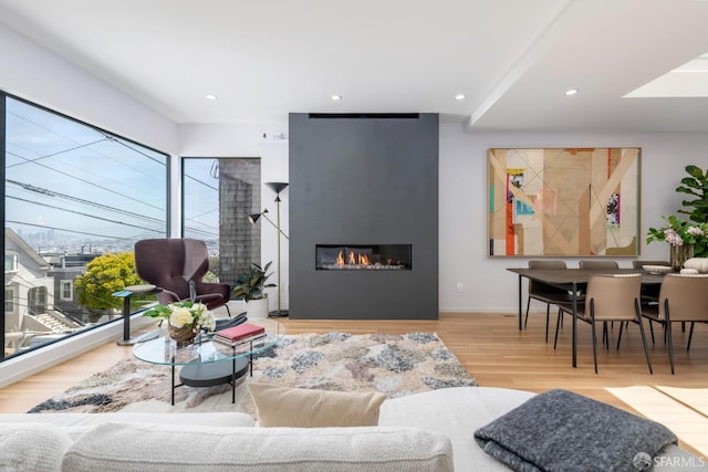 687 28th St, San Francisco, CA 94131 - living area with wood finished floors, a fireplace, baseboards, and recessed lighting