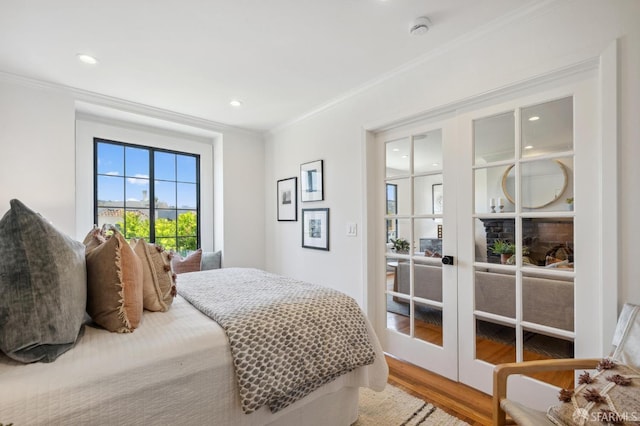 46 Otsego Ave, San Francisco, CA 94112 - bedroom featuring crown molding, french doors, wood finished floors, and recessed lighting