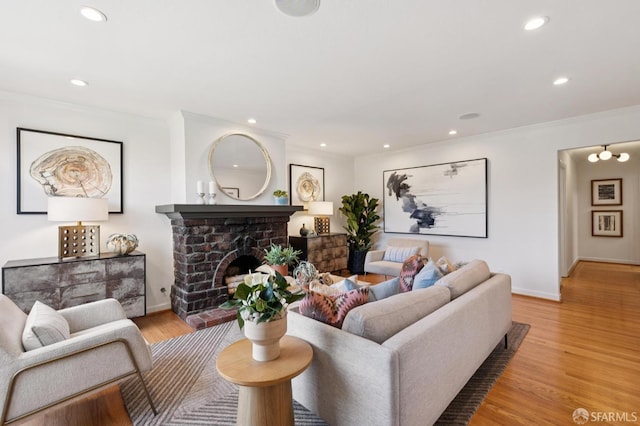 46 Otsego Ave, San Francisco, CA 94112 - living room featuring crown molding, recessed lighting, light wood-style floors, and a fireplace