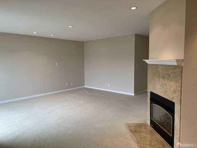 183 Lakeshore Dr, San Francisco, CA 94132 - unfurnished living room with a tiled fireplace, carpet floors, baseboards, and recessed lighting