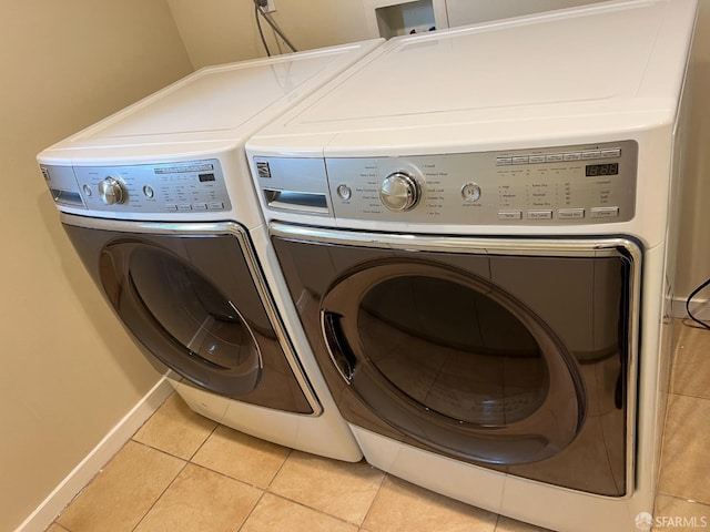 183 Lakeshore Dr, San Francisco, CA 94132 - laundry room featuring independent washer and dryer, laundry area, baseboards, and light tile patterned floors
