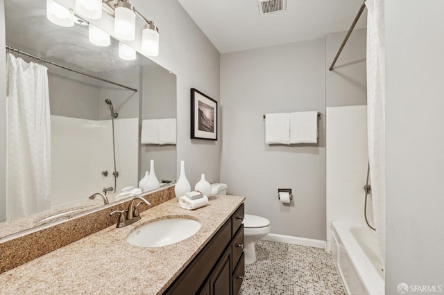 full bathroom featuring toilet, vanity, visible vents, and baseboards