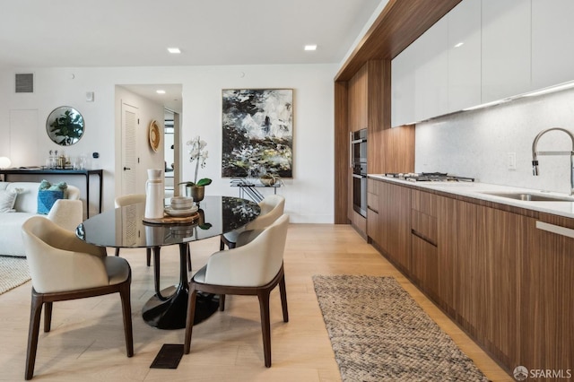 2177 3rd St Unit 421, San Francisco, CA 94107 - dining space featuring light wood-style flooring and recessed lighting