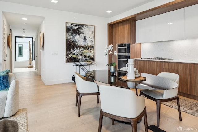 2177 3rd St Unit 421, San Francisco, CA 94107 - dining space with light wood-type flooring, recessed lighting, and baseboards