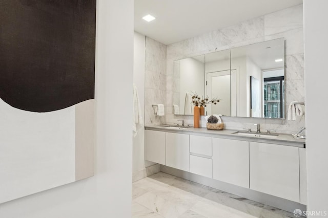 2177 3rd St Unit 421, San Francisco, CA 94107 - full bath featuring marble finish floors, double vanity, and tasteful backsplash
