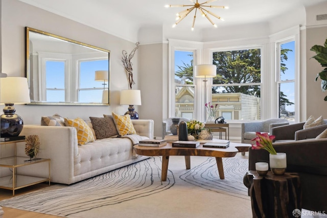 living area featuring a chandelier