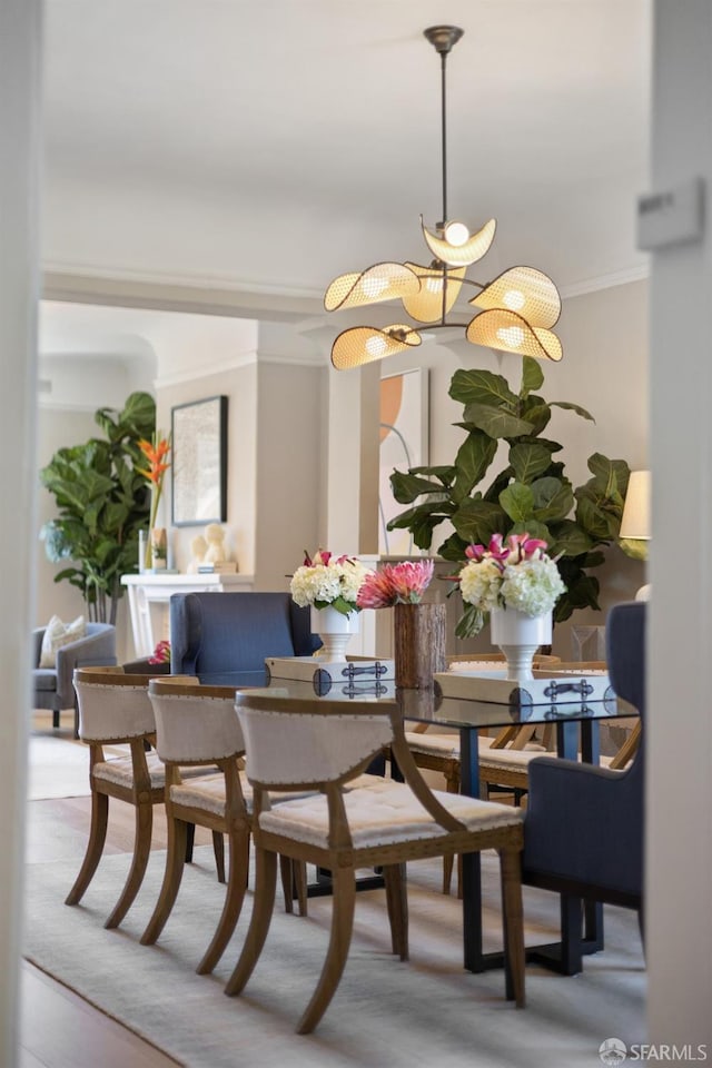 dining room featuring ornamental molding