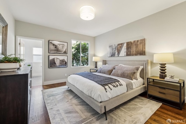 bedroom featuring dark wood-type flooring