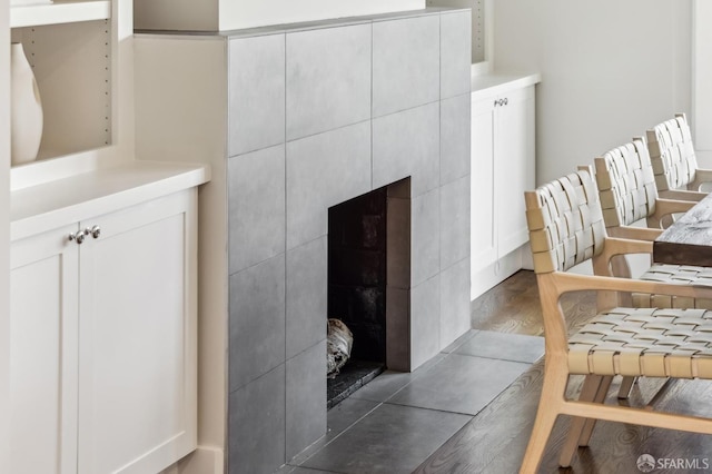 room details featuring hardwood / wood-style flooring and a fireplace