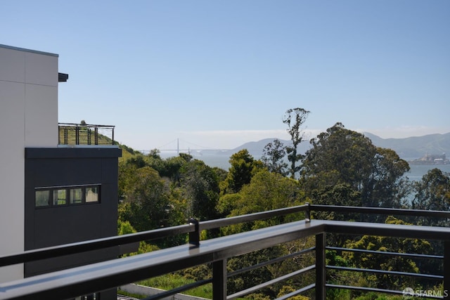 balcony featuring a mountain view