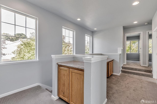 1027 Craftsman Dr, Hercules, CA 94547 - corridor featuring light carpet, plenty of natural light, baseboards, and recessed lighting
