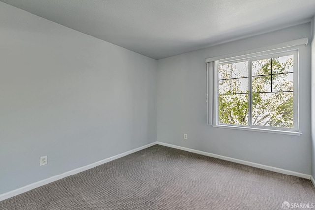 1027 Craftsman Dr, Hercules, CA 94547 - carpeted empty room featuring baseboards