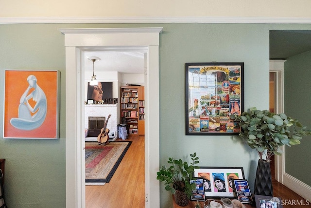 hallway with wood finished floors