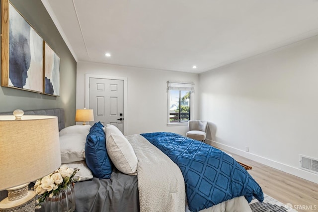 bedroom featuring wood-type flooring