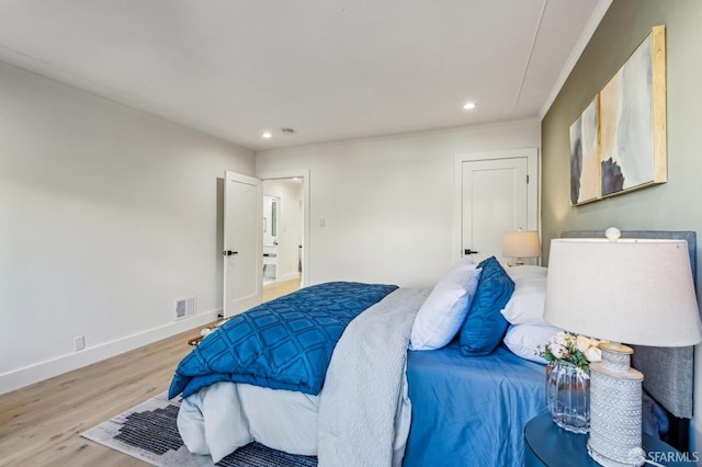 bedroom featuring light wood-type flooring