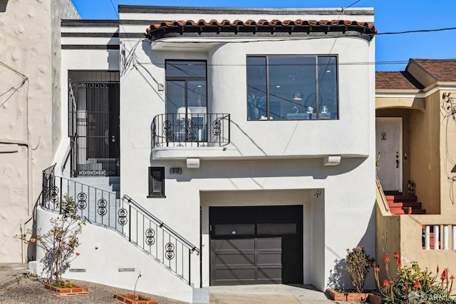 view of front of house with a garage