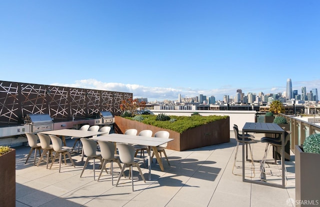 88 Arkansas St Unit 528, San Francisco, CA 94107 - view of patio with a view of skyline and outdoor dining area