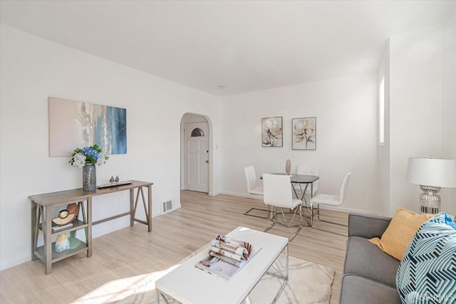 living room featuring light wood-type flooring