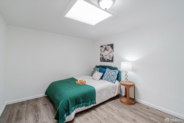 bedroom featuring hardwood / wood-style floors