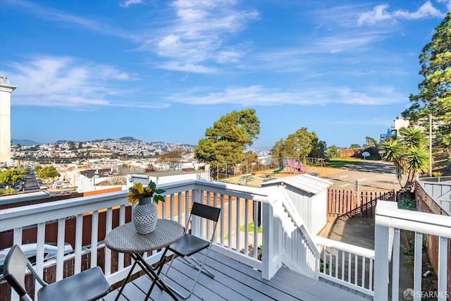 wooden deck featuring a mountain view