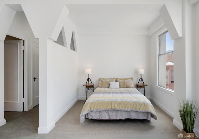 bedroom with light carpet