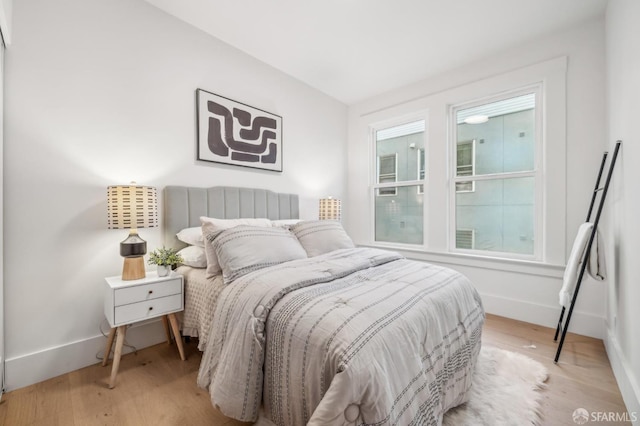 31 Romolo Pl Unit 1, San Francisco, CA 94133 - bedroom featuring baseboards and light wood-style flooring