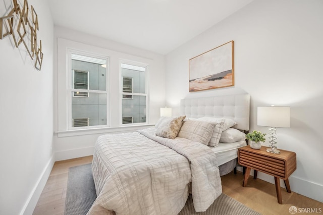 31 Romolo Pl Unit 1, San Francisco, CA 94133 - bedroom featuring light wood-style floors and baseboards