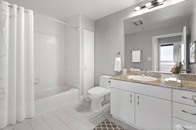 full bathroom with toilet, shower / tub combo with curtain, vanity, and tile patterned flooring