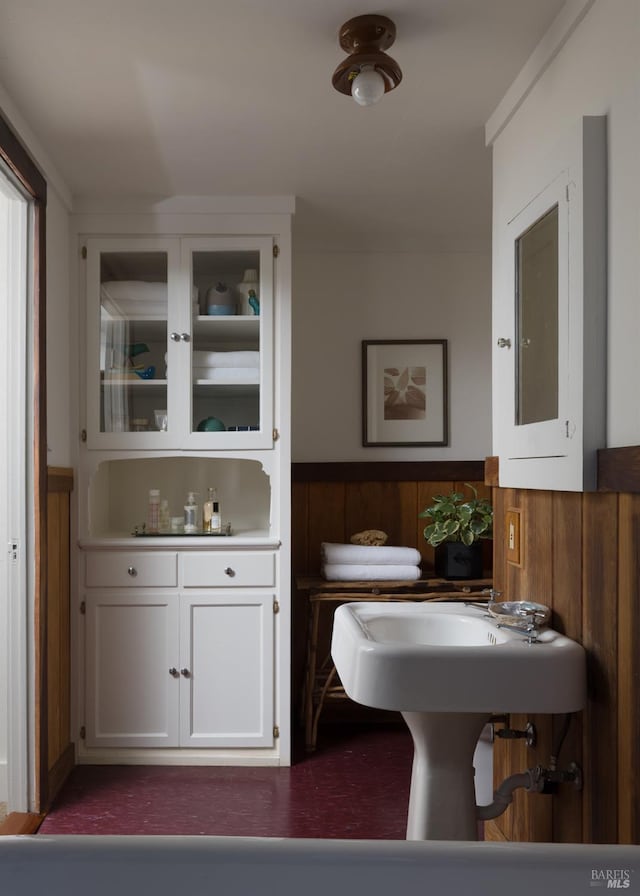 2770 Bohemian Hwy, Occidental, CA 95465 - bathroom featuring a wainscoted wall and wooden walls