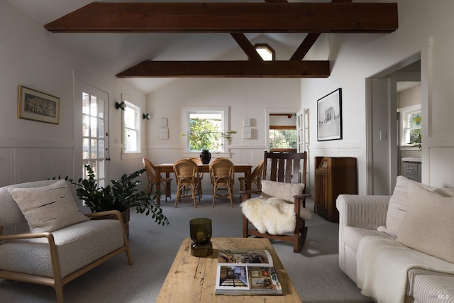2770 Bohemian Hwy, Occidental, CA 95465 - living room featuring carpet flooring, a decorative wall, and wainscoting