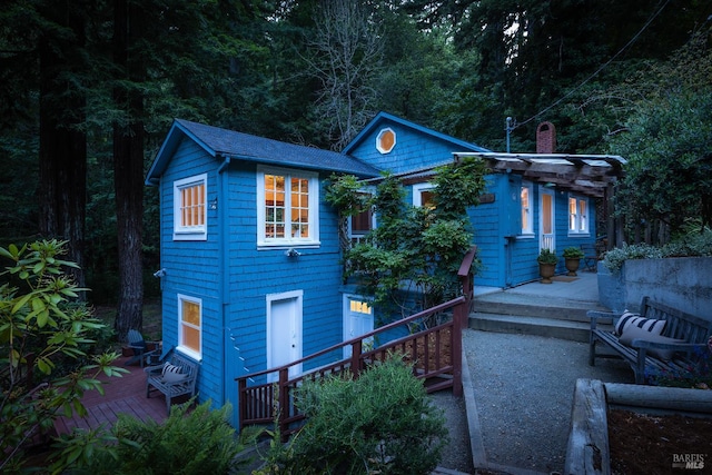 2770 Bohemian Hwy, Occidental, CA 95465 - view of front facade featuring a wooden deck and a chimney
