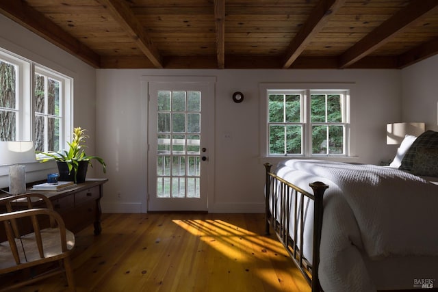 2770 Bohemian Hwy, Occidental, CA 95465 - bedroom with access to outside, light wood-type flooring, a wooden ceiling with exposed beams, and multiple windows